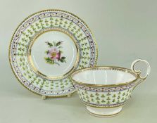 NANTGARW PORCELAIN CUP & SAUCER circa 1818, having a central posy and border of green and gold
