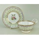 NANTGARW PORCELAIN CUP & SAUCER circa 1818, having a central posy and border of green and gold