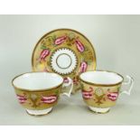 SWANSEA PORCELAIN TRIO circa 1815-1817, decorated in Empire-style pattern of buff tulips and