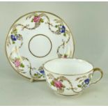 SWANSEA PORCELAIN BREAKFAST CUP & SAUCER circa 1814-1826, decorated with a series of individual