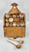 19TH CENTURY WELSH OAK SPOON RACK & COLLECTION OF FIFTEEN TREEN SPOONS the three tier rack with