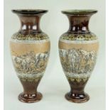 PAIR OF ROYAL DOULTON STONEWARE VASES BY HANNAH BARLOW, each decorated with a wide band of incised
