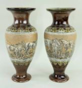 PAIR OF ROYAL DOULTON STONEWARE VASES BY HANNAH BARLOW, each decorated with a wide band of incised