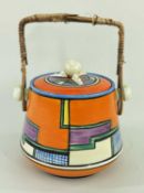 CLARICE CLIFF 'FOOTBALL' PATTERN BISCUIT BARREL & COVER, SHAPE 336, with wicker handleDimensions: