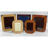 FIVE MODERN SILVER MOUNTED WOOD PHOTOGRAPH FRAMES, Carrs of Sheffield, birds eye maple, walnut and