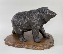 JAPANESE BRONZE BEAR BY AKASOFU GYOKKO, Meiji Period, standing on all fours, gold inlaid irises,