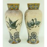 PAIR OF DOULTON LAMBETH STONEWARE VASES BY FLORENCE BARLOW, decorated with geese and scroll
