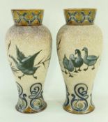 PAIR OF DOULTON LAMBETH STONEWARE VASES BY FLORENCE BARLOW, decorated with geese and scroll