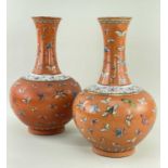 PAIR CHINESE FAMILLE ROSE 'BUTTERFLY' VASES, Guangxu 6-character mark in red, decorated on a coral