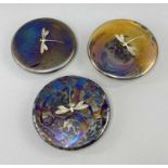 THREE KRIS HEATON ART GLASS PAPERWEIGHTS, of circular disk design with applied sterling silver