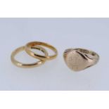 THREE GOLD RINGS comprising a 22ct gold wedding band (2.3gms), an 18ct gold wedding band (3.6gms),