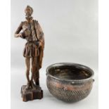 SPANISH CARVED PINE FIGURE OF DON QUIXOTE, holding a book, base stamped 'Ouro', 55cm h, and a
