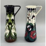 TWO MOORCROFT POTTERY EWERS / JUGS comprising Moorcroft pottery slender ewer in tribute to Charles