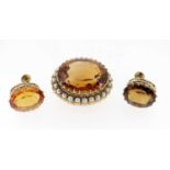 YELLOW METAL SET OVAL CITRINE & PEARL BROOCH, the citrine measuring 23 x 19mms approx., together