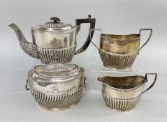 EDWARD VII SILVER BACHELOR'S TEA SET, Birmingham 19091, small half fluted oval, with matched tea