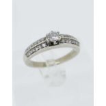 14K GOLD DIAMOND RING, the central stone measuring 0.2cts approx., set with a further 28 graduated