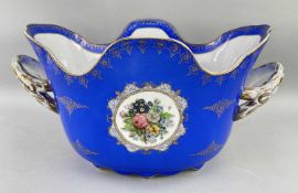 LARGE CONTINENTAL MEISSEN-STYLE PORCELAIN BASIN, decorated with floral medallions reserved on a