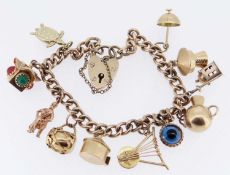 9CT GOLD CURB LINK CHARM BRACELET, having heart shaped padlock, with eleven charms mainly unmarked