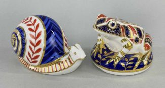 TWO ROYAL CROWN DERBY PAPERWEIGHTS, bone china, in the form of an Imari frog and snail, printed