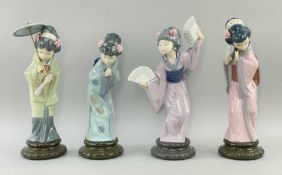 FOUR LLADRO PORCELAIN FIGURES OF JAPANESE GIRLS, with fans and parasol, largest 30cms high Comments: