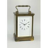 LARGE MATTHEW NORMAN BRASS CARRIAGE CLOCK, white enamel dial, 5-glass case with 11J Swiss platfom