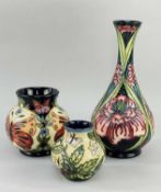 THREE MOORCROFT POTTERY VASES, all with tube-line decoration comprising small squat vase in 'Fruit