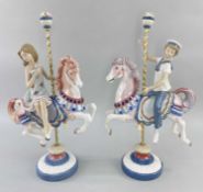 PAIR LLADRO PORCELAIN CAROUSEL HORSE FIGURES, each mounted with a boy and a girl, (1469 and 1470),