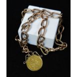 9CT GOLD ELONGATED CURB LINK WATCH CHAIN, having South African 1 Pond gold coin pendant, 1894, 26cms