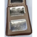 WELSH INTEREST: POSTCARD/PHOTOGRAPH ALBUM, c. 1907-1928, including 5x depicting the rescue at the