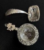 DUTCH SILVER comprising tea strainer by B. W. van Eldik, mid century with lion passant, ornately