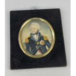 PORTRAIT MINIATURE OF ADMIRAL LORD NELSON, the paper back with crest and banner 'Amor Et Honor',
