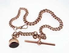 9CT GOLD ALBERT WATCH CHAIN, having graduated curb links, T-bar and gem set seal, believed amethyst,