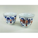 TWO PORTUGESE MARKET CHINESE IMARI TEA BOWLS, Kangxi, painted with double headed eagles and flowers,