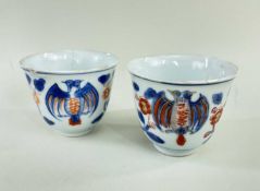 TWO PORTUGESE MARKET CHINESE IMARI TEA BOWLS, Kangxi, painted with double headed eagles and flowers,