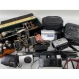 ASSORTED VINTAGE 35MM CAMERAS, ACCESSORIES & a MASSAGER, including tripod, two Sony Handycam,