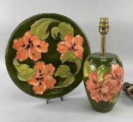 MOORCROFT POTTERY 'HIBISCUS' PATTERN ITEMS comprising table lamp, 30cms high, and platter, paper