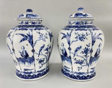 PAIR CHINESE BLUE & WHITE PORCELAIN BALUSTER JARS & COVERS, painted in the Kangxi-style, with