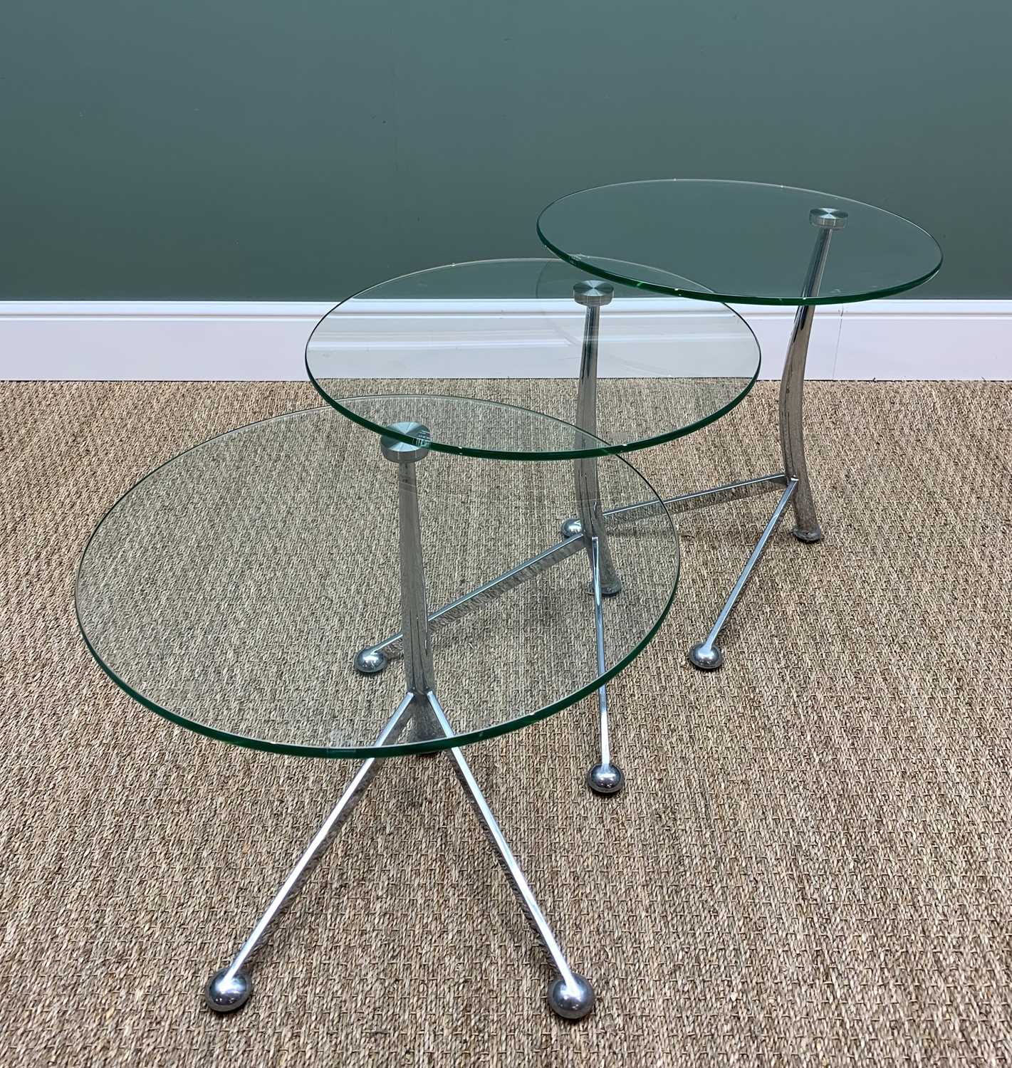 NEST OF THREE MODERN CHROME & GLASS OCCASIONAL TABLES, by So'home Designs, each 50cms diameter (3)