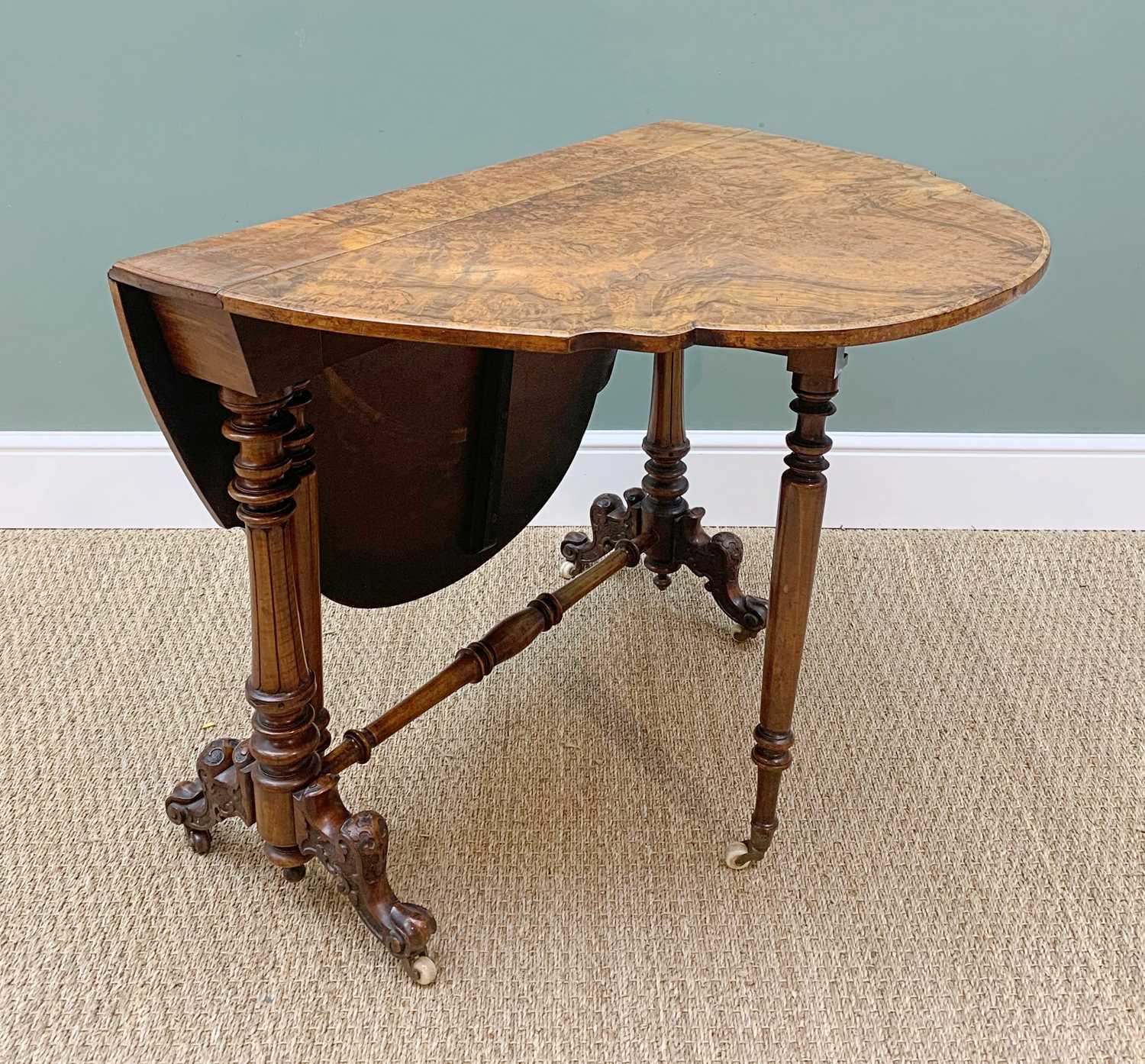 MID VICTORIAN BURR-WALNUT SUTHERLAND TABLE, shaped top over column suppports with blind fret - Image 4 of 6