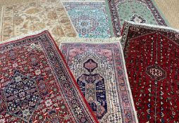 SIX MODERN ORIENTAL-STYLE RUGS, various sizes, largest 155 x 89cms (6)