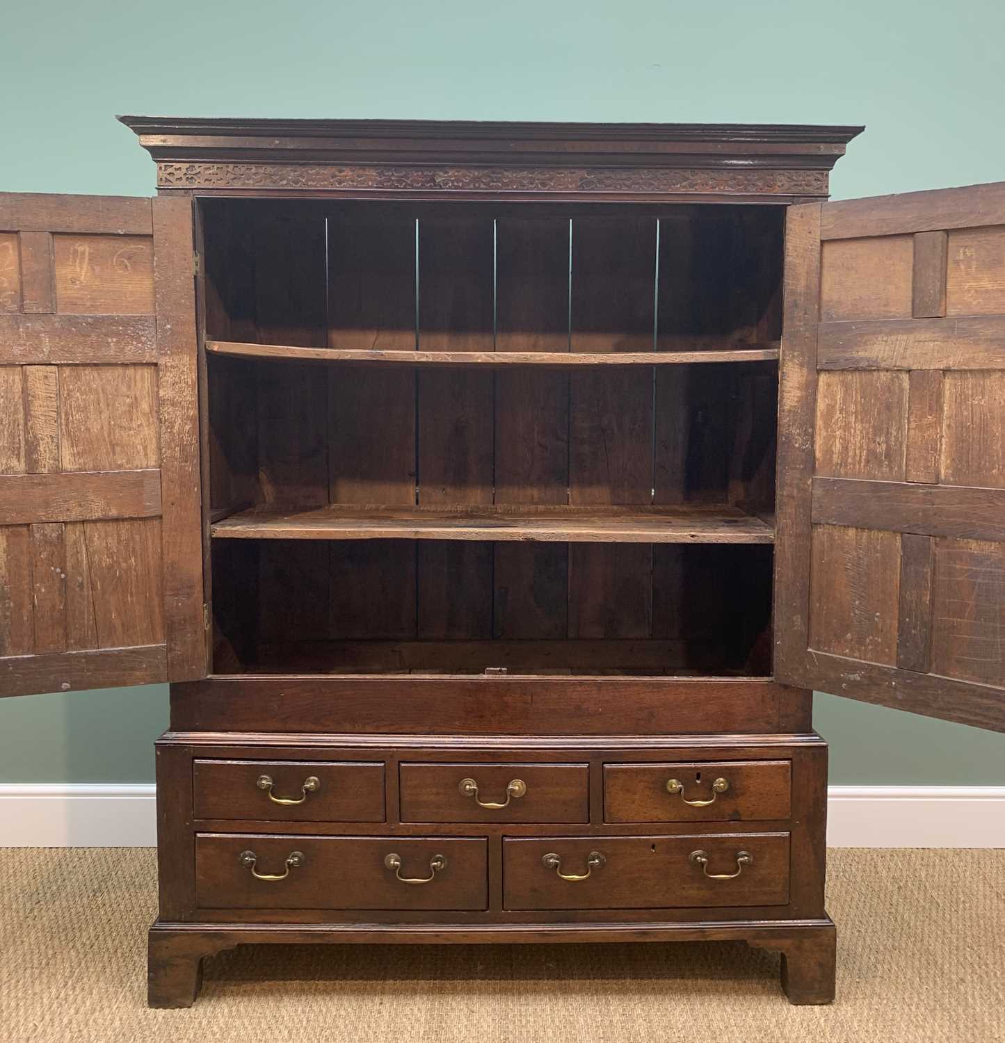 LATE 18TH CENTURY WELSH OAK PRESS CUPBOARD, probably Cardiganshire, cavetto cornice and blind fret - Image 5 of 12