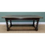 17TH CENTURY-STYLE OAK REFECTORY TABLE, twin plank top with cleated ends, on lunette carved