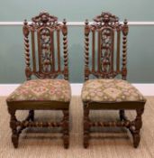 PAIR 17TH CENTURY-STYLE CARVED OAK HALL CHAIRS, elaborate backs carved with green man mask, fruiting