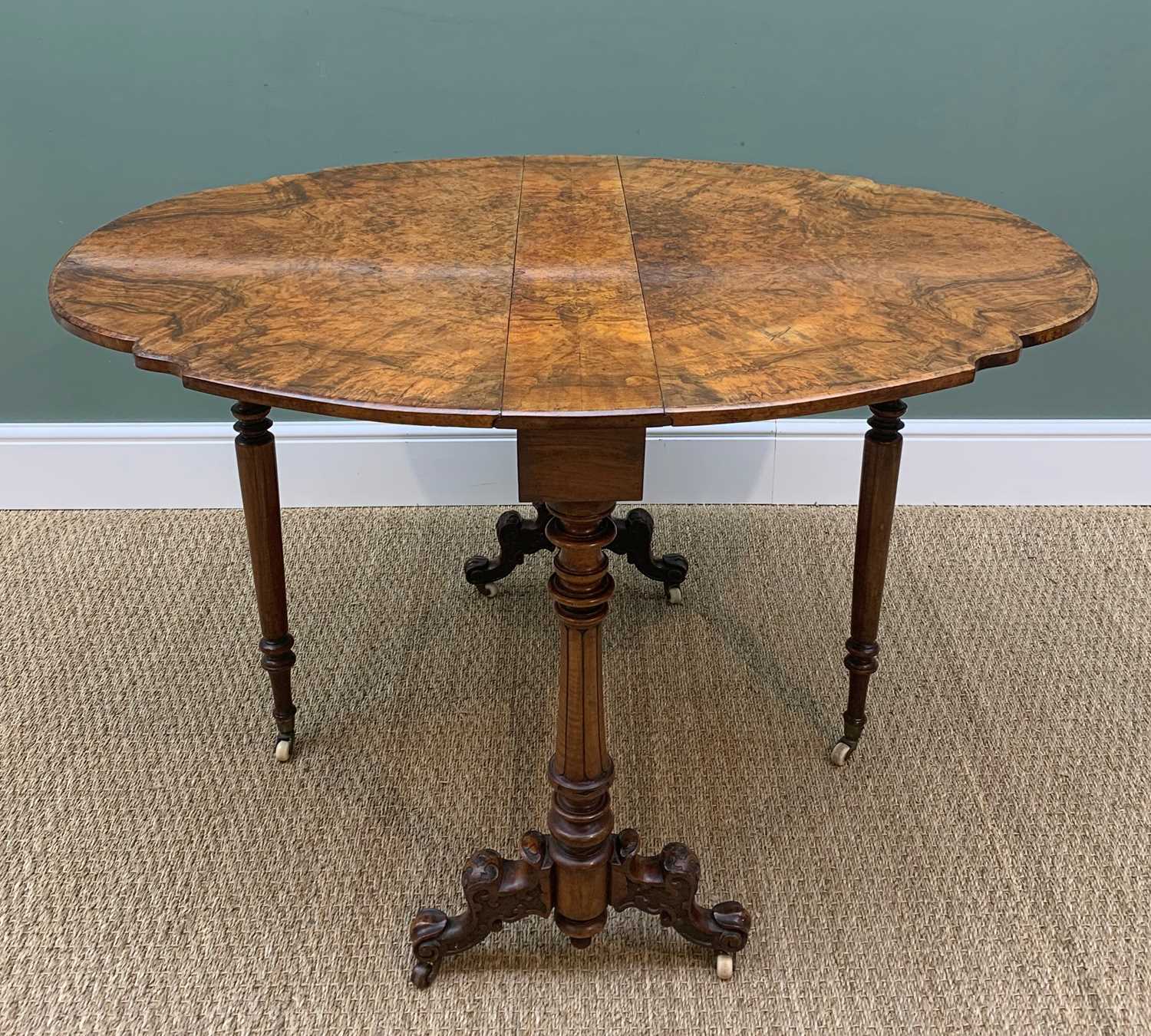 MID VICTORIAN BURR-WALNUT SUTHERLAND TABLE, shaped top over column suppports with blind fret - Image 2 of 6
