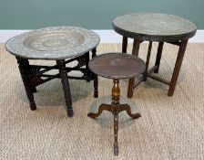 TWO MIDDLE EASTERN METAL FOLDING OCCASIONAL TABLES with circular tops, and a small Georgian style