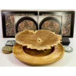 TWO LARGE NATURAL WOOD BOWLS and a quantity of boxed and loose table mats, 47cms across, 48cms