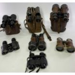 RACING/SPORTING BINOCLUARS - 7 pairs including a set marked 'Ross London' in a leather carry case, a