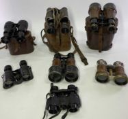 RACING/SPORTING BINOCLUARS - 7 pairs including a set marked 'Ross London' in a leather carry case, a