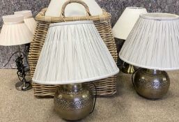 MODERN TABLE LAMPS, two pairs and one other, contained in a two handled wicker basket, along with
