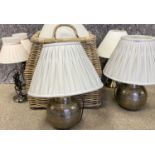 MODERN TABLE LAMPS, two pairs and one other, contained in a two handled wicker basket, along with